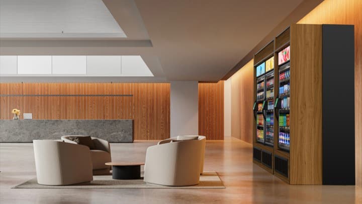 Smart store built into a modern office lobby with wood paneling and lounge seating